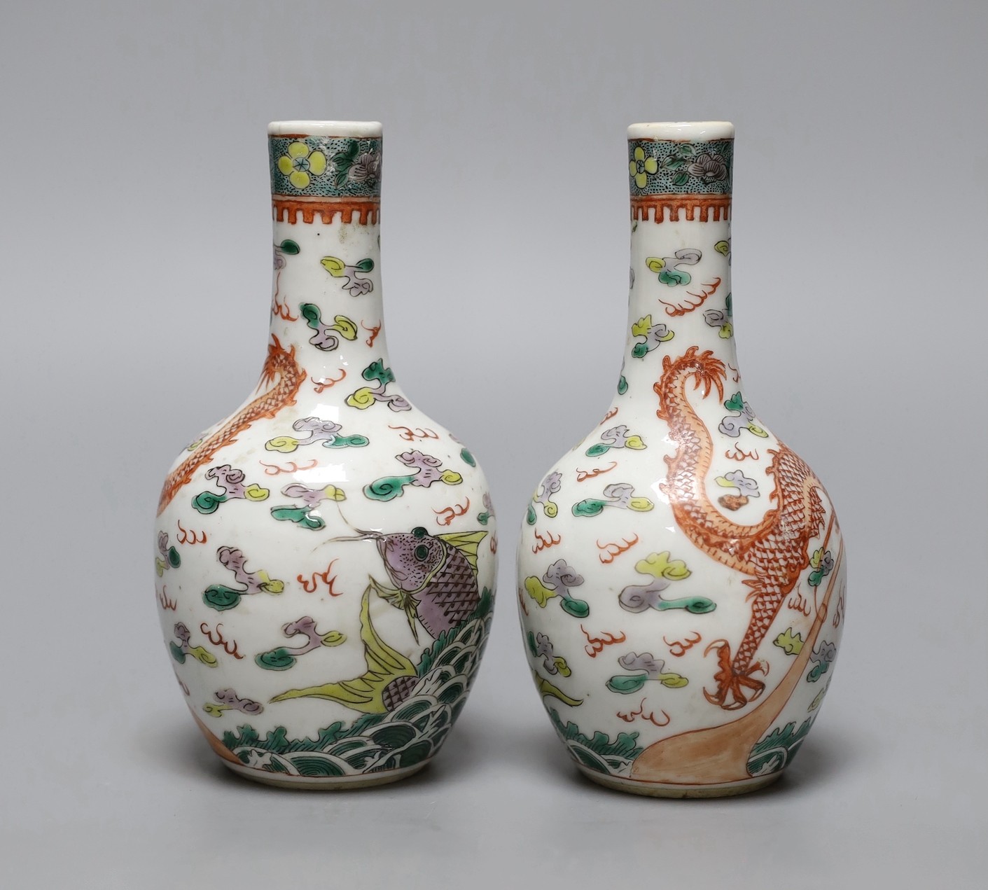 A pair of Chinese enamelled porcelain ‘dragon’ bottle vases, Kangxi marks probably Guangxu period, 15cms high